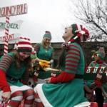 Elves shared a laugh Sunday during Quincy?s annual Christmas Parade.