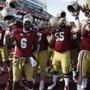 Boston College players celebrate after defeating Louisville during an NCAA college football game in Boston, Saturday, Oct. 13, 2018. (AP Photo/Michael Dwyer)