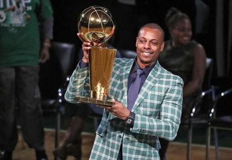 Boston MA 02/11/18 Paul Pierce holding up their 2008 Championship trophy during Boston Celtics retirement ceremony for Paul Pierce jersey number #34 after they played the Cleveland Cavaliers at TD Garden. (Matthew J. Lee/Globe staff) topic: reporter: 
