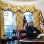 President Trump sat at his desk in the Oval Office during an interview Tuesday with The Washington Post.