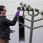 BBROOKLINE, MA - 11/28/2018: Brookline police dust for fingerprints. A menorah was stolen from Temple Emeth in Brookline was found by police and returned broken. (David L Ryan/Globe Staff ) SECTION: METRO TOPIC 29menorah