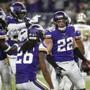 Minnesota Vikings free safety Harrison Smith (22) celebrates with teammates after intercepting a pass during the first half of an NFL football game against the New Orleans Saints, Sunday, Oct. 28, 2018, in Minneapolis. (AP Photo/Bruce Kluckhohn)