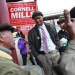 Then-candidate Cornell Mills campaigned at Dudley Station in Roxbury in 2011.