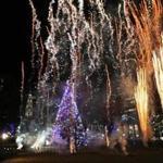 Boston, MA 11-29-18: Fireworks explode around the just lit tree at the conclusion of the ceremonies marking the 77th Annual Tree Lighting on Boston Common. (Jim Davis/Globe Staff)