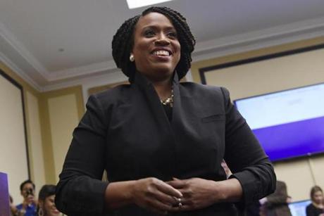 Rep.-elect Ayanna Pressley, D-Mass., smile after drawing her number during the Member-elect room lottery draw on Capitol Hill in Washington, Friday, Nov. 30, 2018. Pressley drew 38 out of 85, which determines the order in which she gets to select her new Capitol Hill office. (AP Photo/Susan Walsh)
