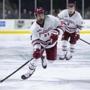 Umass Amherst sophomore forward Mitchell Chaffee (21) skates up ice while followed by sophomore right winger John Leonard (9) in the third period against Princeton at the Mullins Center in Amherst, Massachusetts on November 24, 2018. UMass defeated Princeton 3-2 in overtime. Matthew Healey for The Boston Globe