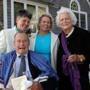 Former president George H.W. Bush (front left) and wife Barbara Bush (right) at the wedding of longtime friends Helen Thorgalsen (center) and Bonnie Clement in Kennebunkport, Maine, in 2013. 
