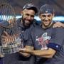 Los Angeles, CA: 10-28-18: Red Sox pitchers David Price (left) and Nathan Eovaldi (right) pose with the trophy as the Red Sox celebrate their World Series victory. The Boston Red Sox visited the Los Angeles Dodgers in Game Five of the World Series at Dodger Stadium. (Jim Davis/Globe Staff)