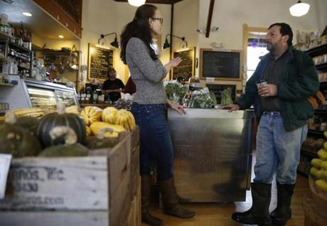 Hillary Leicher, a manager at Chef?s Market, and egg farmer Chris Recchia discuss law enforcement in Randolph, Vt., which is now covered by the Orange County sheriff?s office. 
