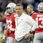 Ohio State head coach Urban Meyer watches during his team warm up before the Big Ten championship NCAA college football game against Northwestern, Saturday, Dec. 1, 2018, in Indianapolis. (AP Photo/AJ Mast)