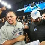 Detroit, MI: 9-23-18: Lions head coah Matt Patricia (right) is pictured with Patriots head coach Bill Belichick (left) following the Detroit victory.The New England Patriots visited the Detroit Lions in a regular season Sunday Night NFL football game at Ford Field. (Jim Davis/Globe Staff)