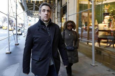 Michael Cohen departed his New York apartment building on Friday.

