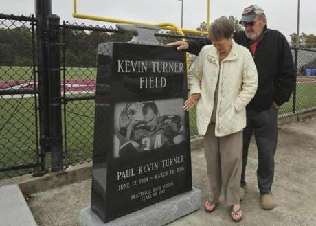 FOR FUTURE HOHLER STORY Myra and Raymond Turner, parents of pro football player Kevin Turner, visit the memorial for their son at the Kevin Turner Field, at the Stanley-Jensen Stadium, Prattville, Alabama. Turner's photograph is on the memorial. Turner's nickname was 