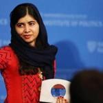 Malala Yousafzai, 2014 Nobel Laureate, gestured to the crowd after accepting the 2018 Gleitsman Award at the Harvard Kennedy School in Cambridge Thursday.  