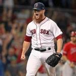 Boston, MA: 6-27-18: Both the crowd and Red Sox reliever Craig Kimbrel erupt after he got a strile out to end the top of the eighth inning,leaving the bases loaded. The Boston Red Sox hosted the Los Angeles Angels for a regular season MLB baseball game at Fenway Park (Jim Davis/Globe Staff) 