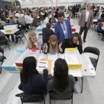 Workers at the Broward County Supervisor of Elections office during a hand recount in Florida on Nov. 16.