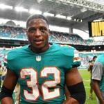 MIAMI, FL - DECEMBER 09: Kenyan Drake #32 of the Miami Dolphins after defeating the New England Patriots 34-33 at Hard Rock Stadium on December 9, 2018 in Miami, Florida. (Photo by Mark Brown/Getty Images)
