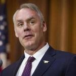 Secretary of the Interior Ryan Zinke speaks after an order withdrawing federal protections for countless waterways and wetland was signed, at EPA headquarters in Washington, Tuesday, Dec. 11, 2018. (AP Photo/Cliff Owen)
