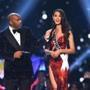 TOPSHOT - Catriona Gray (R) of the Philippines speaks while host Steve Harvey listens during the interview of top three finalists of the 2018 Miss Universe Pageant in Bangkok on December 17, 2018. (Photo by Lillian SUWANRUMPHA / AFP)LILLIAN SUWANRUMPHA/AFP/Getty Images
