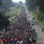 *2018 Year In Focus - News* CIUDAD HIDALGO, MEXICO - OCTOBER 21: A migrant caravan walks into the interior of Mexico after crossing the Guatemalan border on October 21, 2018 near Ciudad Hidalgo, Mexico The caravan of Central Americans plans to eventually reach the United States. U.S. President Donald Trump has threatened to cancel the recent trade deal with Mexico and withhold aid to Central American countries if the caravan isn't stopped before reaching the U.S. (Photo by John Moore/Getty Images)