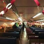 20decorate - Riders were treated to a bit of holiday cheer Wednesday morning after a train conductor decorated the inside of a vehicle. (Todd Douglass)
