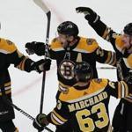 Patrice Bergeron (center) gave the Bruins a 1-0 lead in the first period.