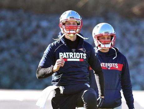 Foxboro-12/26/18 The Patriots practiced at their practice field at Gillette Stadium. QB Tom Brady warms up with Brian Hoyer(rt) during practice.Photo by John Tlumacki/Globe Staff(sports)
