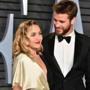 FILE: Singer/actor Miley Cyrus and actor Liam Hemsworth have married, according to posts on their social media accounts. BEVERLY HILLS, CA - MARCH 04: Miley Cyrus (L) and Liam Hemsworth attend the 2018 Vanity Fair Oscar Party hosted by Radhika Jones at Wallis Annenberg Center for the Performing Arts on March 4, 2018 in Beverly Hills, California. (Photo by Dia Dipasupil/Getty Images)