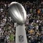 A giant replica of the Vince Lombardi Trophy is wheeled onto the field before an NFL football game between the Philadelphia Eagles and the Atlanta Falcons, Thursday, Sept. 6, 2018, in Philadelphia. (AP Photo/Michael Perez)