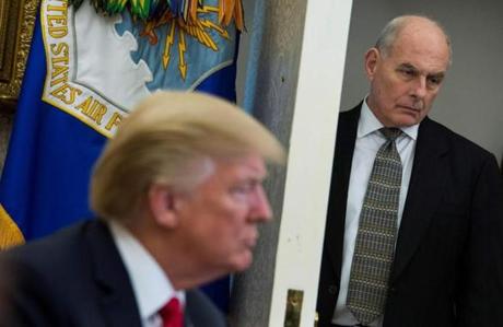(FILES): In this file photo taken on February 02, 2018, White House Chief of Staff John Kelly looks on as US President Donald Trump meets with North Korean defectors in the Oval Office at the White House in Washington, DC. - Outgoing White House Chief of Staff John Kelly said he had 