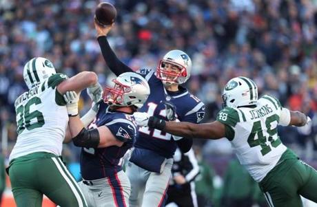 Tom Brady was 24 of 33 passing for 250 yards and four touchdowns against the Jets.

