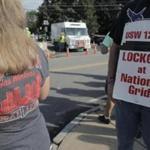 A protest by locked-out National Grid workers in Woburn this fall.  