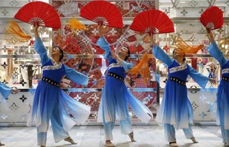  Dancers with the Melody Dance Troupe performed during the Chu Ling Dance Academy showcase inside the Copley Mall as part of First Night Boston 2019 in Boston. Jessica Rinaldi/Globe Staff
