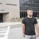 Jesse Carrillo leaves the Hampshire County Superior Courthouse following his arraignment on charges of involuntary manslaughter in the death of UMass Amherst student Eric Sinacori. Mr. Carillo was released on $25,000 cash bail.photo by Barry Goldstein.