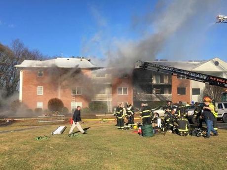 One person died and another was taken to the hospital after a car crashed into a Fall River condo complex, sparking a three-alarm fire in Tuesday morning.

