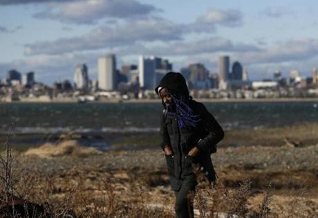 Boston, MA, 01/1/2019 -- Joye Williams, of Dorchester walked along the shoreline at Thompson Island. For 35 years the Friends of the Boston Harbor Islands have been running a New Year's Day excursion to Thompson Island. (Jessica Rinaldi/Globe Staff) Topic: 02islandtrip Reporter: 
