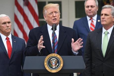US President Donald Trump, with Vice President Mike Pence (L) and Republican US Representative Kevin McCarthy (R), speaks at a press conference in the Rose Garden of the White House in Washington, DC, on January 4, 2019. - Trump met with congressional leaders as the government shutdown continues. (Photo by SAUL LOEB / AFP)SAUL LOEB/AFP/Getty Images
