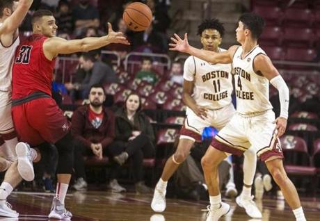 Chris Herren Jr. (right) and Vin Baker Jr. (second from right) in action for BC against Fairfield.
