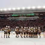 SOUTH BEND, INDIANA - JANUARY 01: The Boston Bruins celebrate after beating the Chicago Blackhawks 4-2 in the 2019 Bridgestone NHL Winter Classic at Notre Dame Stadium on January 01, 2019 in South Bend, Indiana. (Photo by Gregory Shamus/Getty Images)