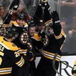 Boston, MA - 1/05/2019 - (1st period) Boston Bruins right wing Chris Wagner (14) and teammates celebrate his goal in the first period. The Boston Bruins host the Buffalo Sabres at TD Garden. - (Barry Chin/Globe Staff), Section: Sports, Reporter: Matt Porter, Topic: 06Sabres-Bruins, LOID: 8.4.4286814094.