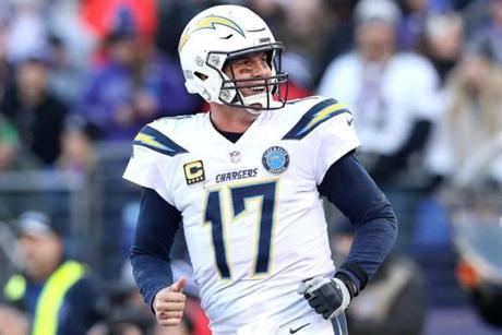 BALTIMORE, MARYLAND - JANUARY 06: Philip Rivers #17 of the Los Angeles Chargers celebrates after throwing a two point conversion to Mike Williams #81 against the Baltimore Ravens during the fourth quarter in the AFC Wild Card Playoff game at M&T Bank Stadium on January 06, 2019 in Baltimore, Maryland. (Photo by Rob Carr/Getty Images)
