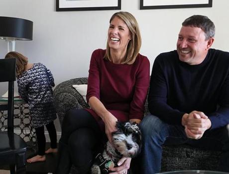 Representative Lori Trahan joined her husband, Dave, and their dog at their home. Their daughter Caroline, 4, is at left.
