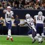 New Orleans, LA: September 17, 2017: Patriots quarterback Tom Brady (left) throws a short pass to a wide open running back James White (28). The New England Patriots visited the New Orleans Saints in a regular season NFL football game at the Mercedes-Benz Superdome. (Jim Davis/Globe Staff).