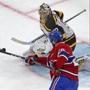 01-14-18: Boston, MA: The Canadiens Jeff Petry swings his stick and knocks the puck out of the air and by Bruins goalie Tuukka Rask 15 seconds into overtime to give Montreal a 3-2 victory. The Boston Bruins hosted the Montreal Canadiens in a regular season NHL hockey game at the TD Garden. (jim Davis/Globe Staff)
