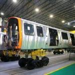 New Orange Line cars on the production floor of the factory in Springfield last month. 