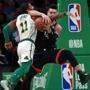 01-16-19: Boston: MA: The Celtics Kyrie Irving gets tangled up with the RaptorsDanny Green, first quarter action. The Boston Celtics hosted the Toronto Raptors in a regular season NBA basketball game at the TD Garden. (Jim Davis/Globe Staff)