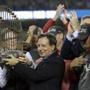 Boston Red Sox owner John Henry (left) and chairman Tom Werner held the championship trophy at the World Series.