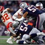 Foxborough, MA - 10/14/2018 - (2nd quarter) Kansas City Chiefs running back Spencer Ware (32) is wrapped up by a host of New England Patriots defenders. The New England Patriots host the Kansas City Chiefs in a Sunday night NFL game at Gillette stadium in Foxborough. - (Barry Chin/Globe Staff), Section: Sports, Reporter: Jim McBride, Topic: 15Patriots-Chiefs, LOID: 8.4.3482575762.