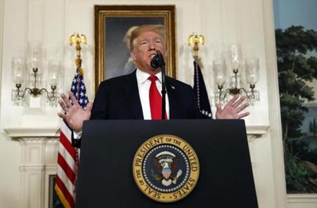 President Donald Trump speaks about the partial government shutdown, immigration and border security in the Diplomatic Reception Room of the White House, in Washington, Saturday, Jan. 19, 2019.
