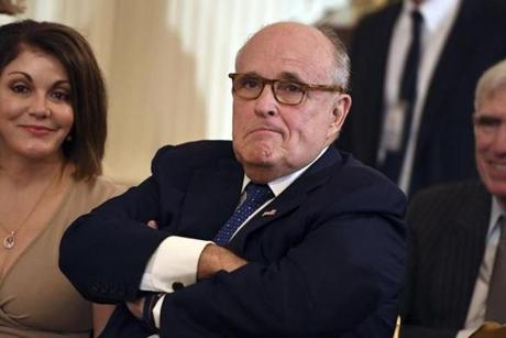 (FILES) In this file photo Lawyer of the US president Rudy Giuliani looks on before the US president announces his Supreme Court nominee in the East Room of the White House on July 9, 2018 in Washington, DC. - US President Donald Trump had conversations about a proposed project to build a Trump Tower in Moscow throughout the 2016 presidential campaign, far later than previously acknowledged, his lawyer said January 20, 2019. Trump's conversations with his then personal lawyer and fixer, Michael Cohen, who was spearheading the negotiations in Moscow, continued throughout the year until October or November 2016, Rudy Giuliani said.
